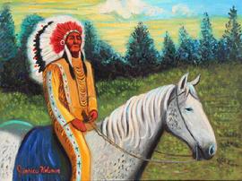 Indian Cheif with full   feather head dress and decorative buckskins is sitting on a grey and white dappled horse  veiwing a sunset.