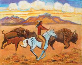 Indian buffalo hunter is riding his pony along side the buffalo charging along the prarrie.