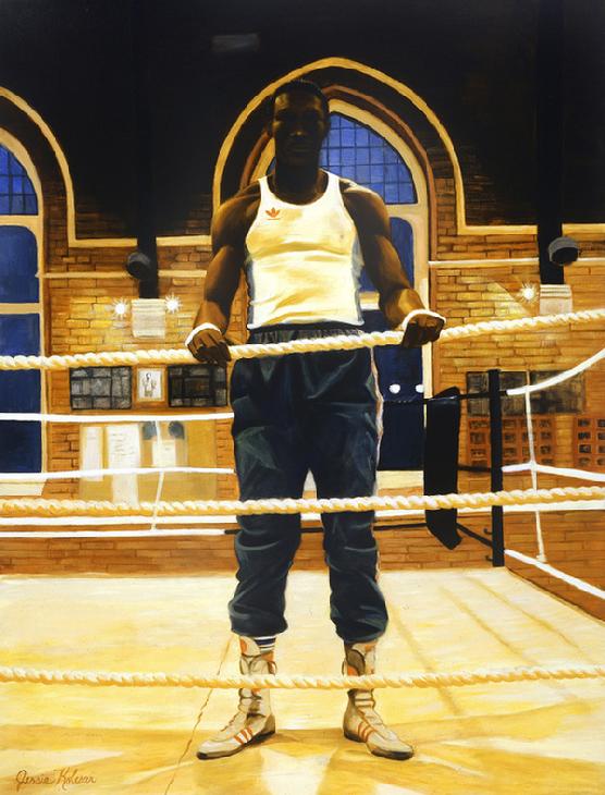 A black Boxer is standing in a boxing gym with his hand on the ropes