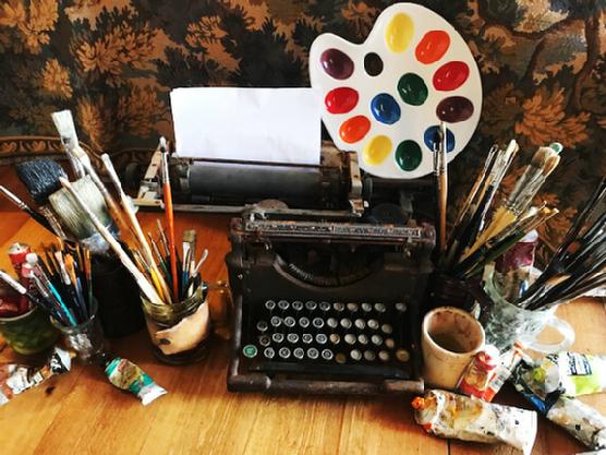 Typewriter and art supplies